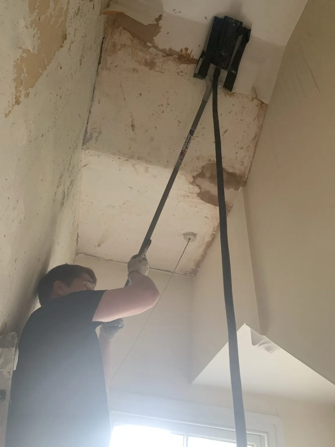 Men with Ven carrying out non-structural rip-out work